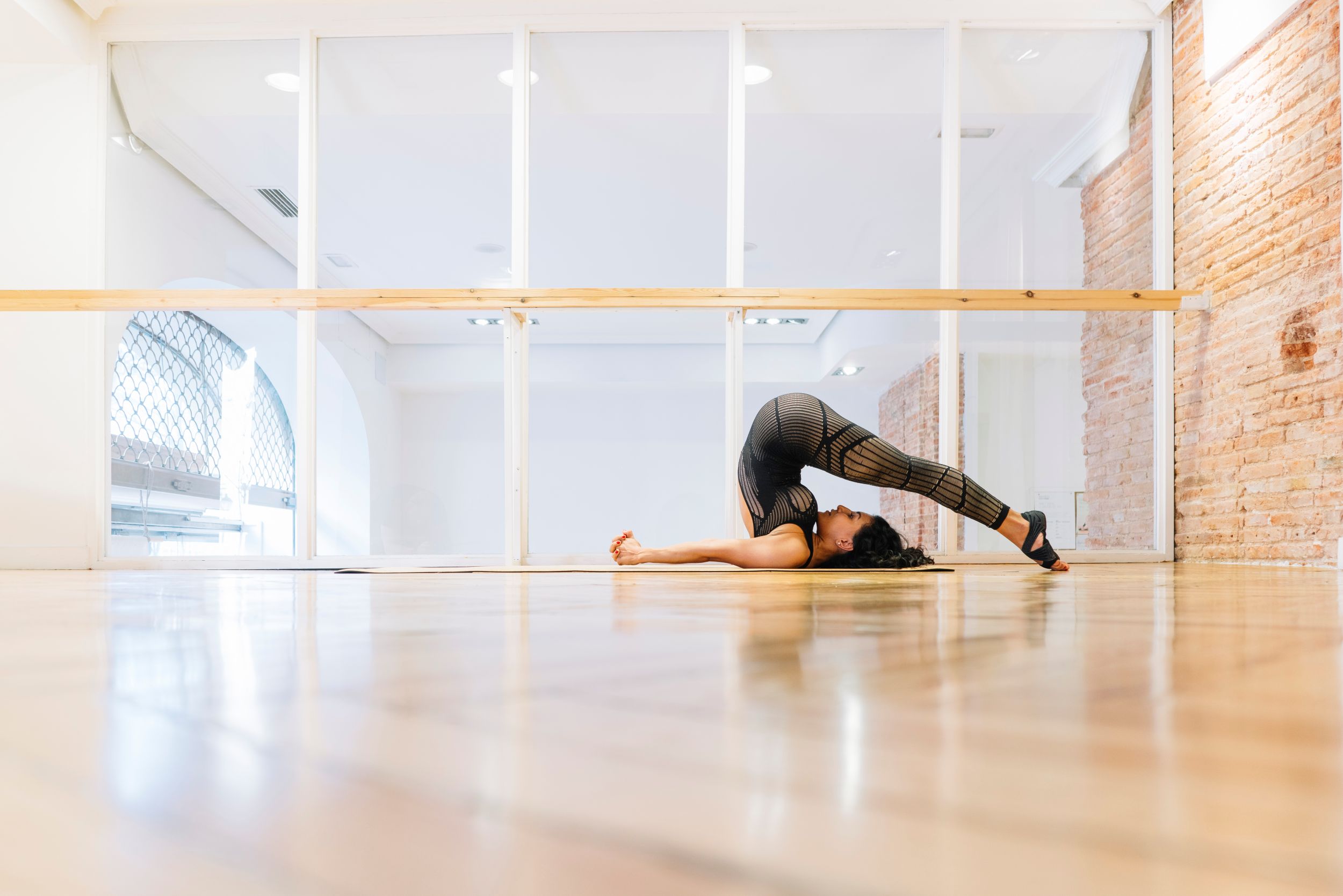 brunette-woman-practicing-yoga